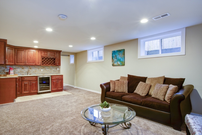 Stunning basement interior with wet bar