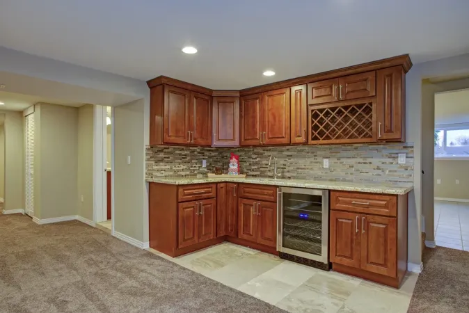 Stunning basement interior with wet bar