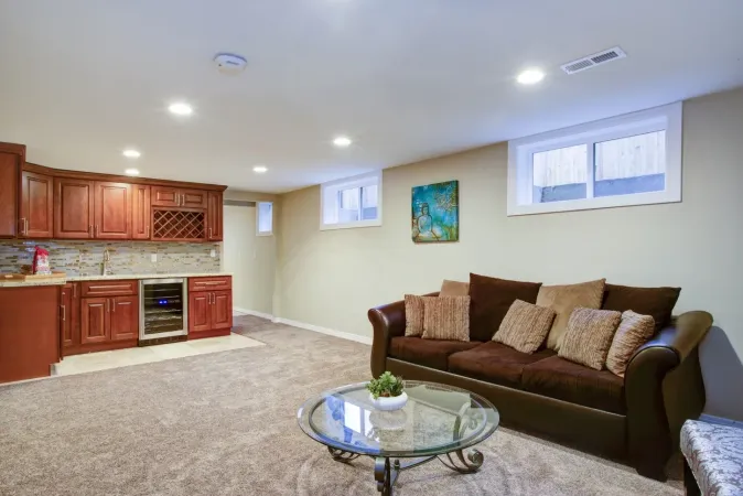 Stunning basement interior with wet bar